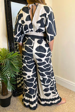 MERLA Giraffe Print Jumpsuit - Black (NO RETURNS)